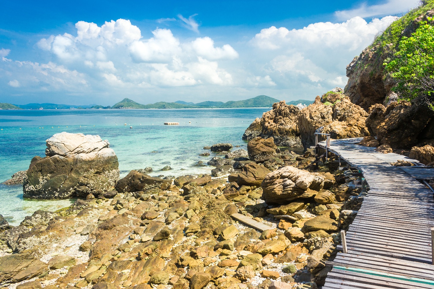 tropical-island-rock-wood-bridge-beach-with-blue-sky.jpg