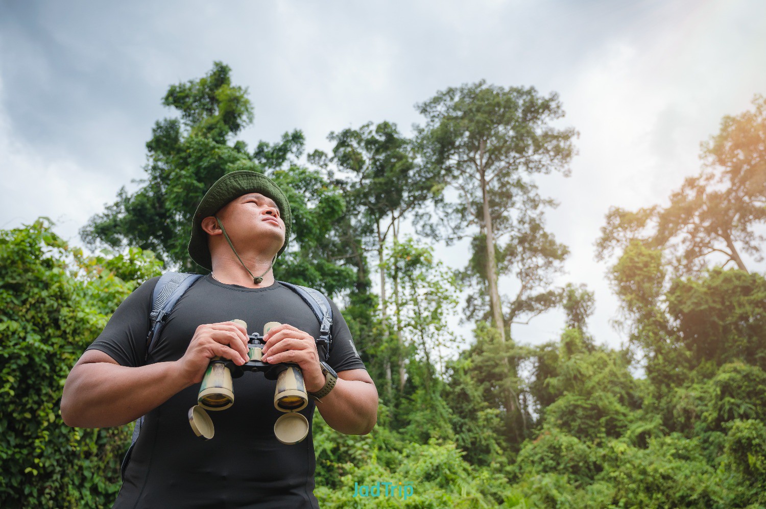 young-male-tourists-carrying-backpack-travel-by-hitchhiking-travel-by-hitchhikin.jpg