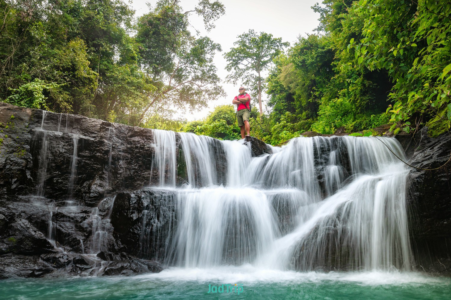 young-male-tourists-carrying-backpack-travel-by-hitchhiking-travel-by-hitchhikin.jpg