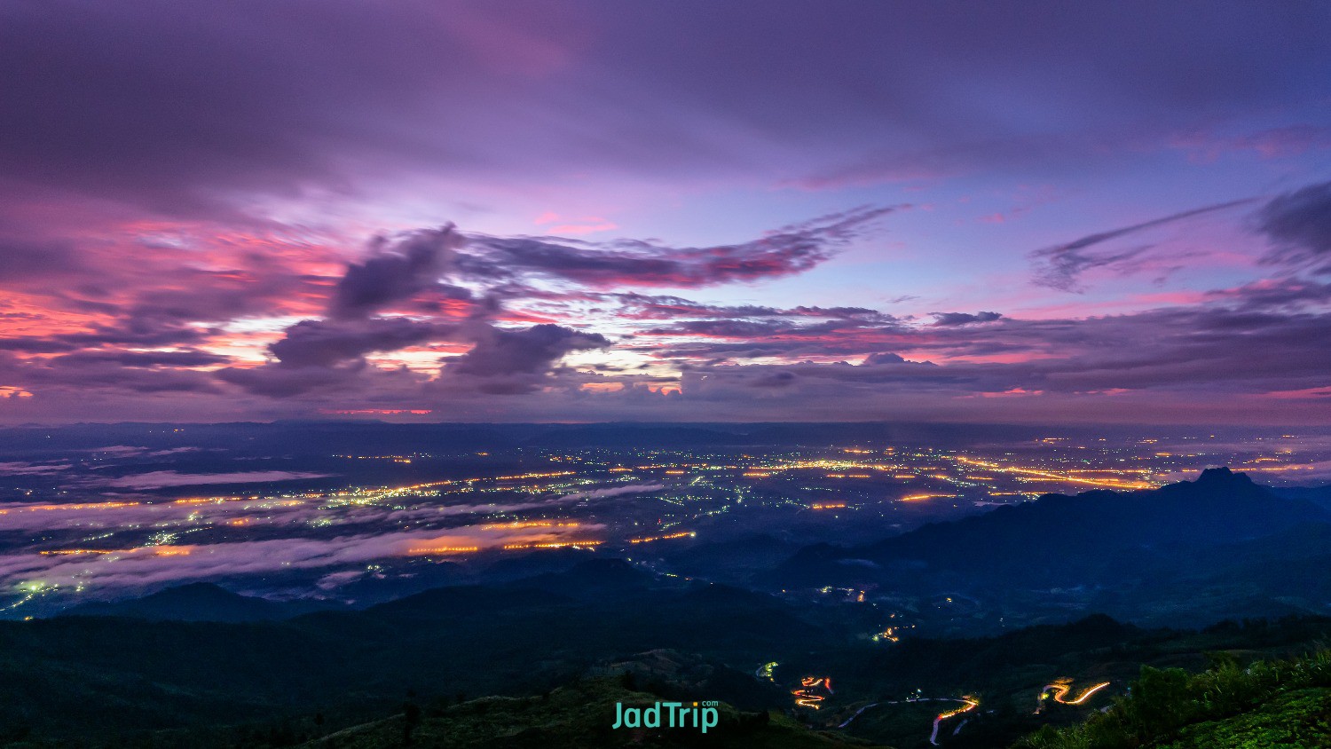 high-view-beautiful-nature-landscape-colorful-sky-during-sunrise-see-lights-road.jpg