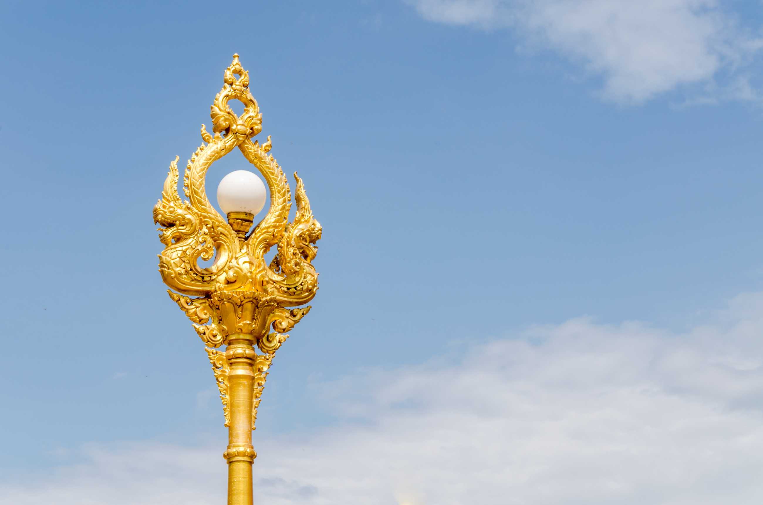 golden-lamp-wat-phra-that-phanom-nakhon-phanom-province-northeastern-thailand_jadtrip.jpg